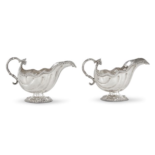 Lot 58 - A fine pair of George III sterling silver sauceboats