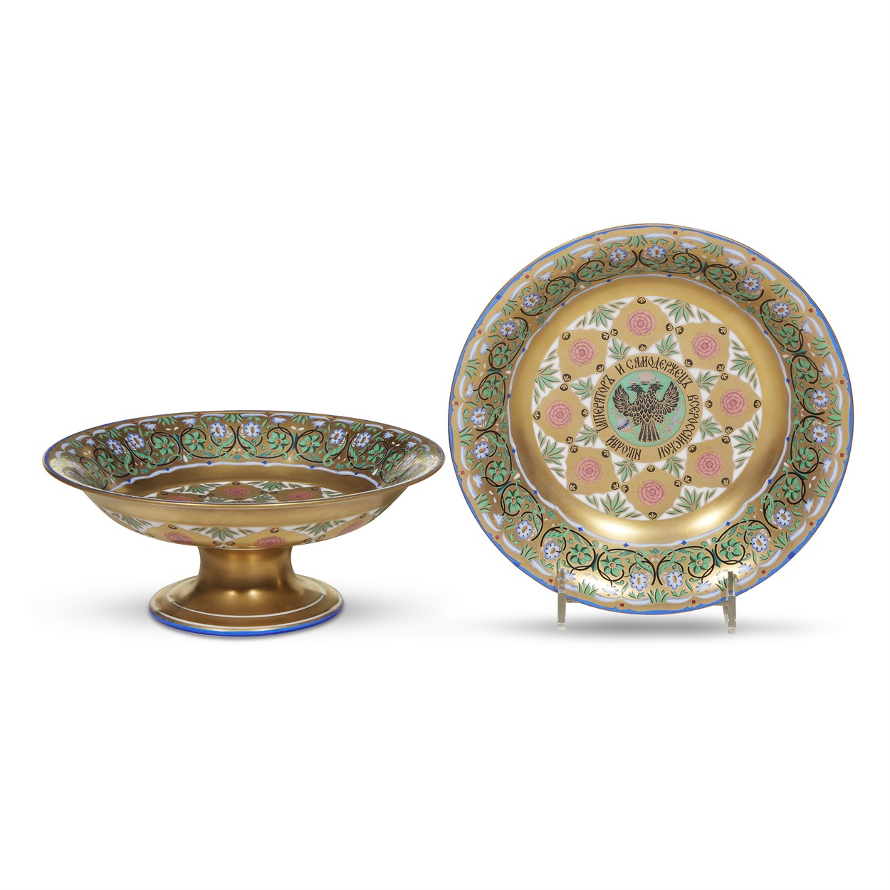 Lot 1 - A pair of hand-painted and parcel-gilt porcelain tazze decorated in the manner of the 'Great Kremlin Service'