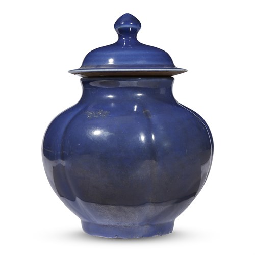 Lot 273 - A Chinese blue monochrome lobed jar and cover