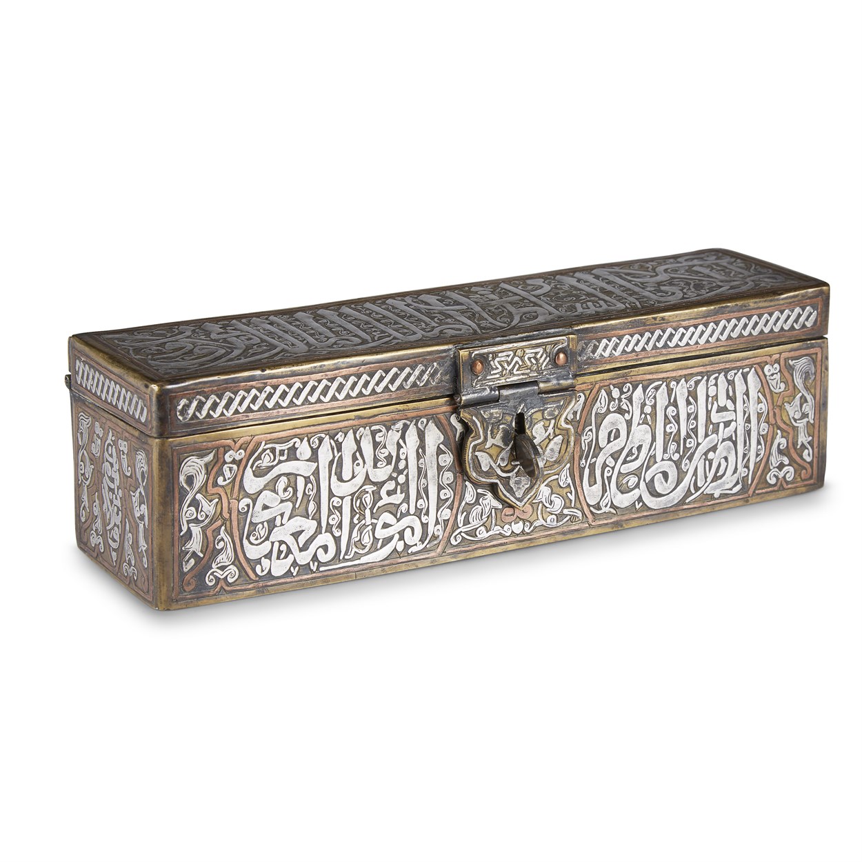 Lot 146 - A Mamluk revival silver and copper-inlaid rectangular brass kalamdan