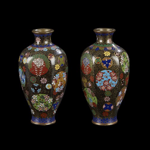 Lot 74 - A pair of small Japanese cloisonne hexagonal vases decorated with floral roundels