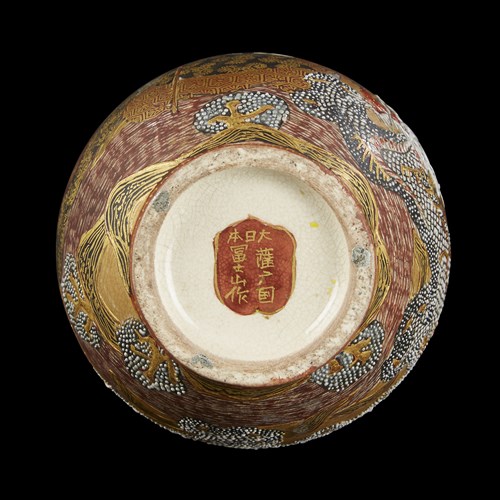 Lot 95 - A Satsuma enameled pottery "Dragon and Rakan" small bottle vase