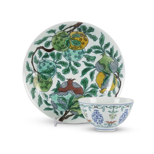 Lot 268 - A Chinese porcelain incised and enameled "Sanduo" dragon dish, Kangxi six-character mark, and a doucai bowl, Yongzheng mark