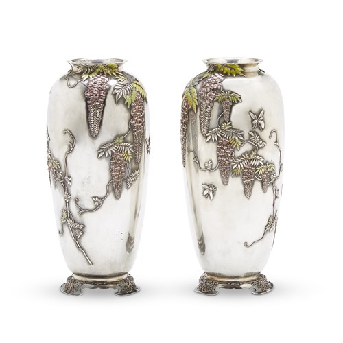 Lot 78 - A pair of finely-decorated Japanese enameled silver "Wisteria" vases, Sanju Saku
