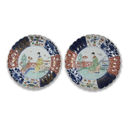 Lot 272 - A pair of Chinese "Imari" porcelain fluted dishes depicting Meiren in a garden