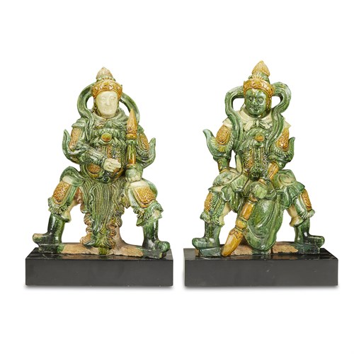 Lot 248 - A pair of Chinese yellow and green-glazed pottery figures  of "Tianwang"
