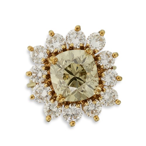 Lot 138 - A colored diamond, diamond and eighteen karat gold ring