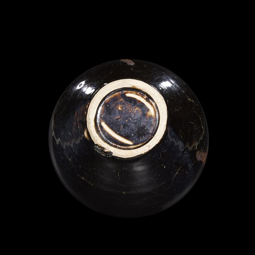 Lot 157 - A Chinese black-glazed globular jar