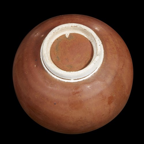 Lot 164 - A Chinese small persimmon-glazed ding jar and cover