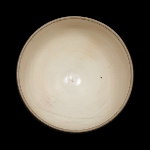 Lot 164 - A Chinese small persimmon-glazed ding jar and cover