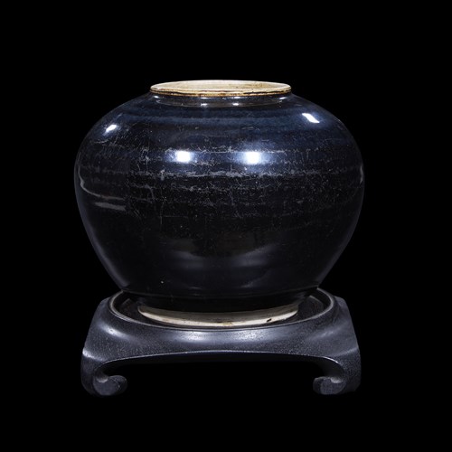 Lot 158 - A Chinese ovoid black-glazed jar