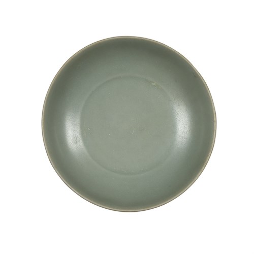 Lot 167 - A Chinese Longquan celadon "lotus" small circular dish
