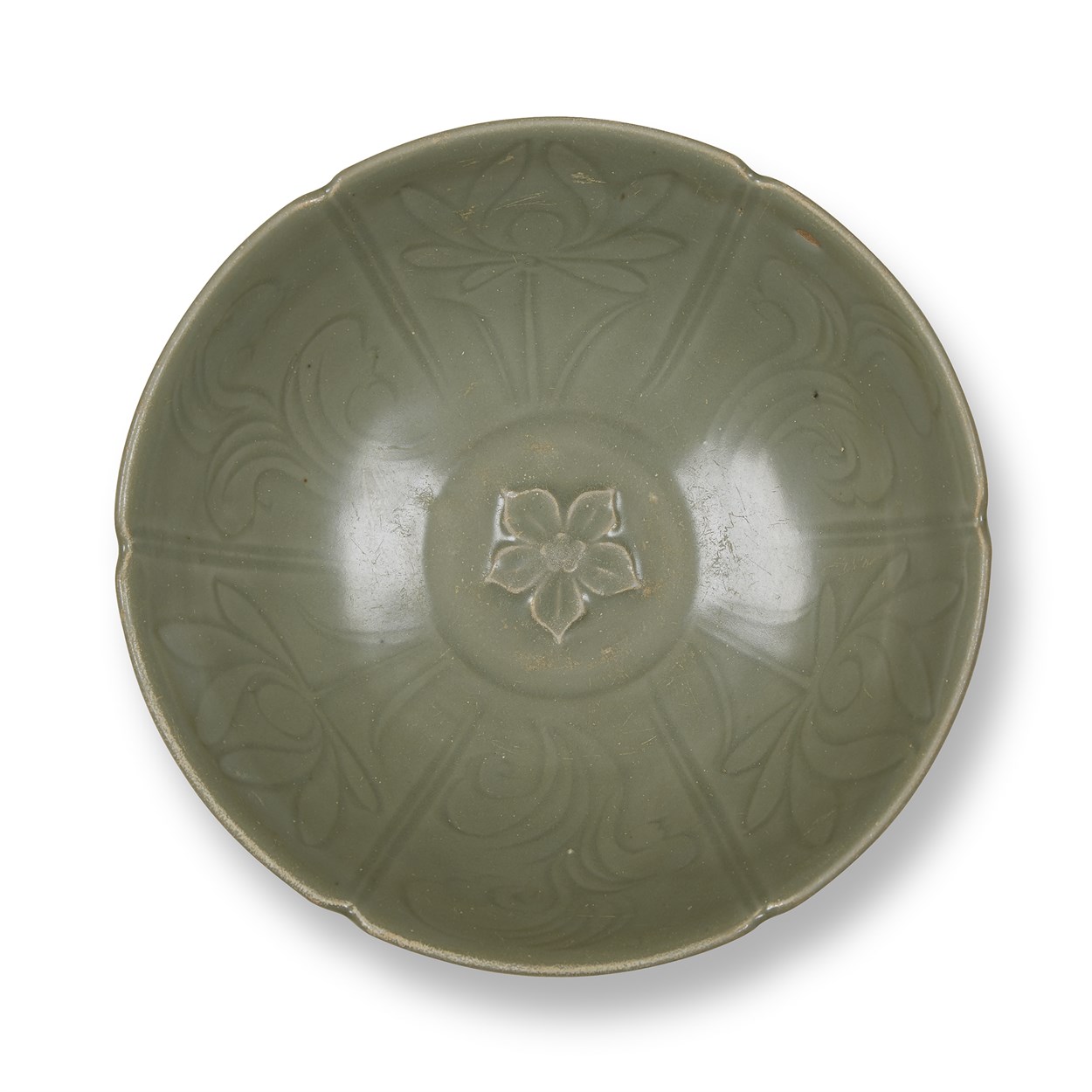 Lot 168 - A Chinese Longquan celadon bowl with foliate rim