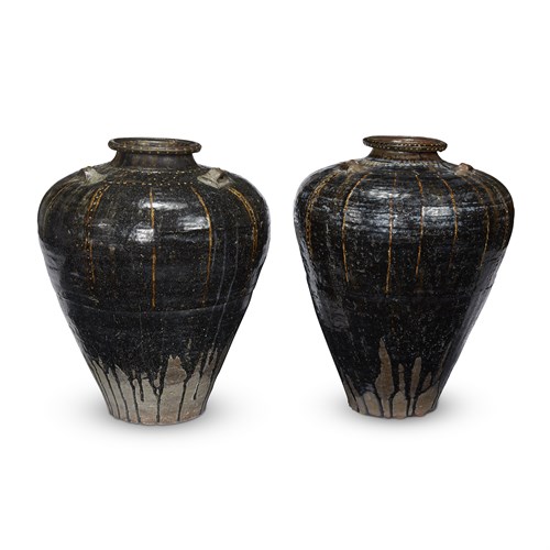 Lot 197 - An associated pair of large brown-glazed "Martaban" jars