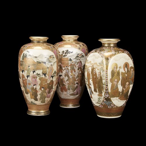 Lot 97 - A pair of Satsuma pottery ovoid vases, together with a squared vase