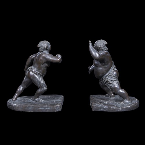 Lot 46 - A pair of Japanese patinated bronze sumo wrestler bookends