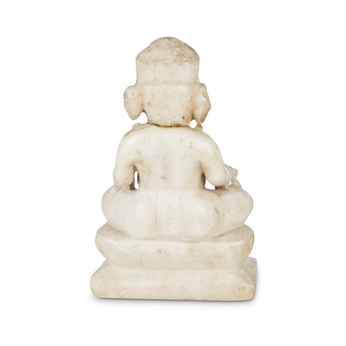 Lot 128 - An Indian carved white marble figure of Ganesha seated