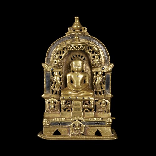 Lot 129 - Indian silver-inlaid copper alloy figure of a seated Jain Tirthankara
