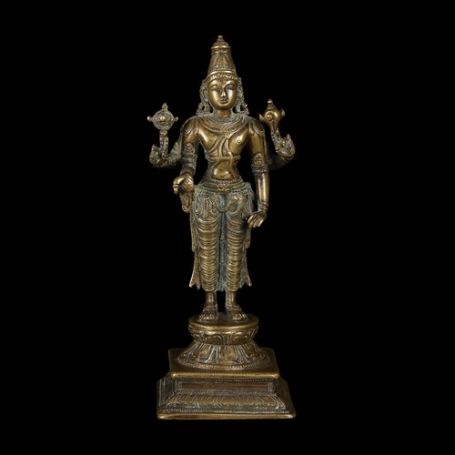 Lot 135 - An Indian copper alloy figure of standing Vishnu