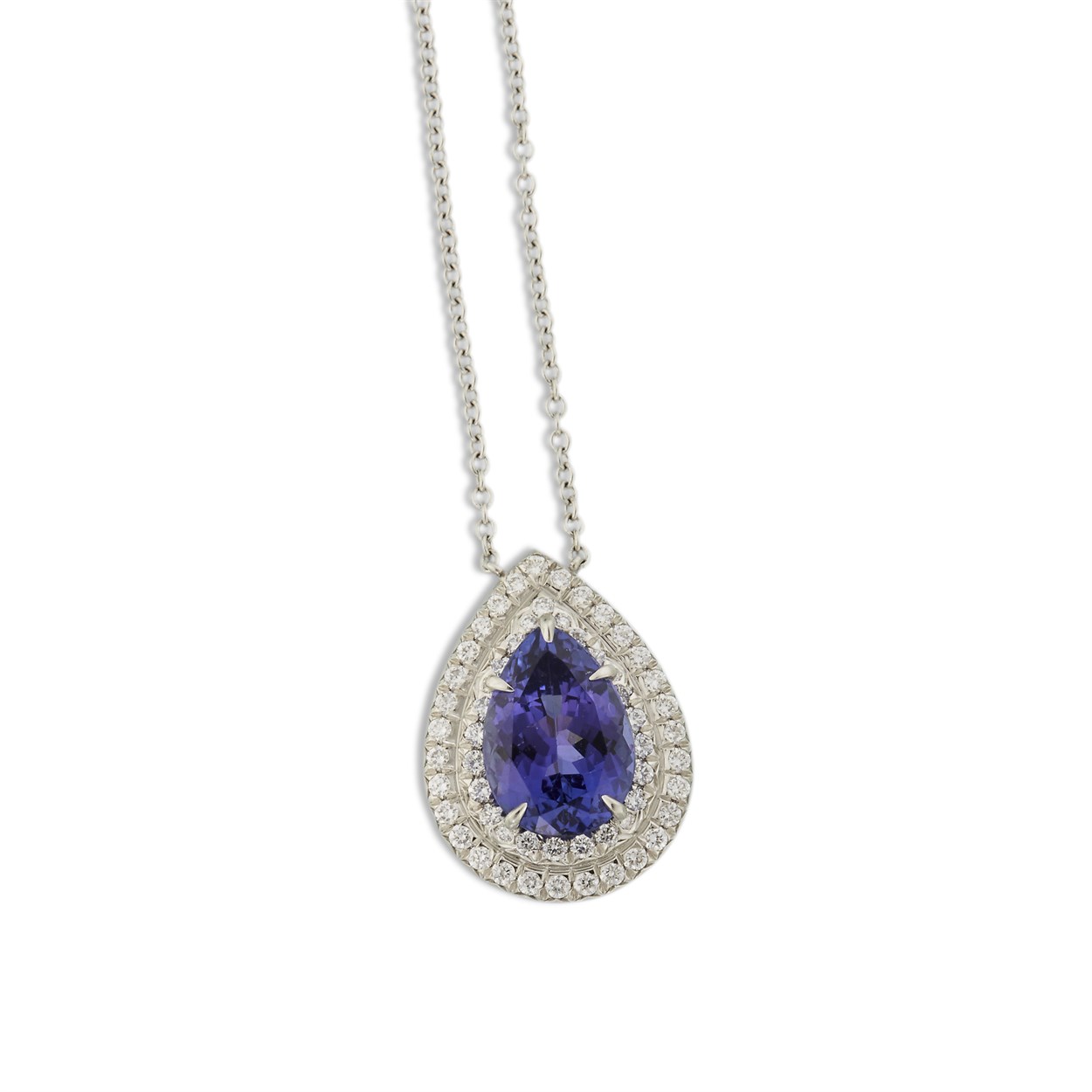 Lot 42 - A tanzanite, diamond and platinum pendant-necklace, Tiffany & Co.
