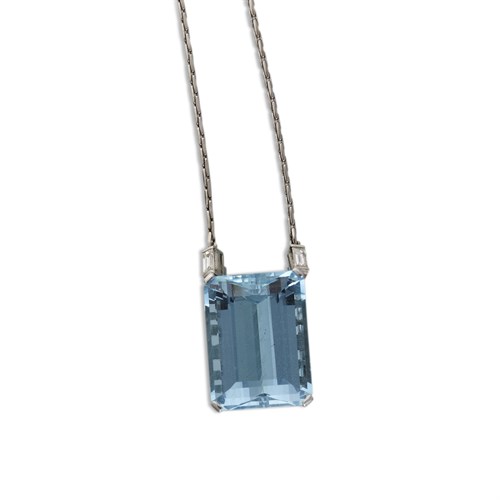 Lot 150 - An aquamarine, diamond and fourteen karat white gold pendant with chain
