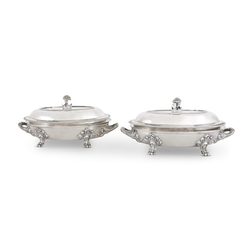 Lot 62 - A pair of George III sterling silver covered vegetable dishes with Crest of Hamilton finials