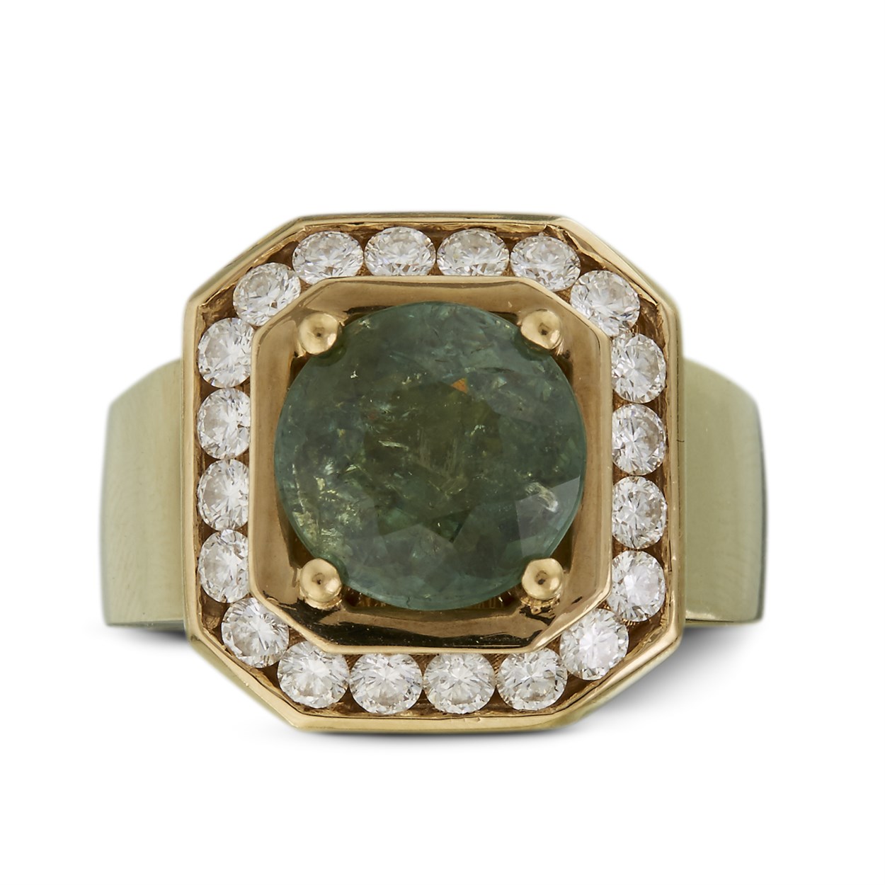 Lot 45 - A demantoid garnet, diamond and ten karat gold ring