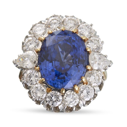 Lot 90 - A sapphire, diamond and fourteen karat gold ring