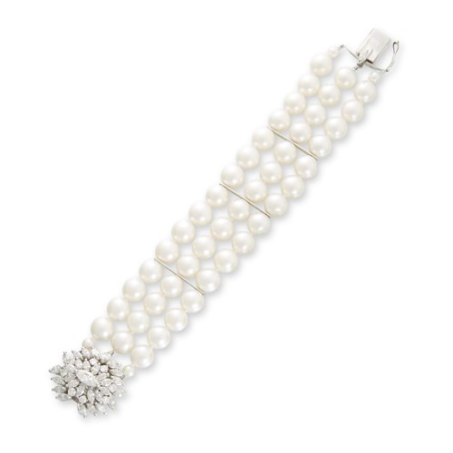 Lot 74 - A cultured pearl, diamond, and platinum bracelet