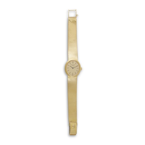 Lot 73 - A lady's eighteen karat gold bracelet watch, Patek Philippe