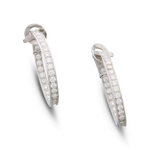Lot 82 - A pair of diamond and eighteen karat white gold hoop earrings, Van Cleef & Arpels