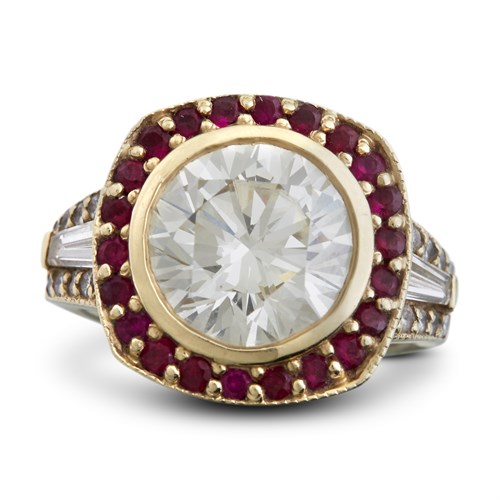 Lot 41 - A diamond, ruby and fourteen karat gold ring