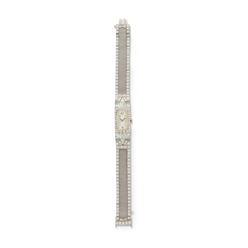 Lot 94 - Art Deco diamond, emerald, and platinum bracelet watch